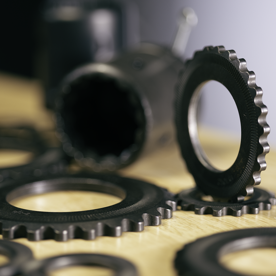 Various HYTORC Washers and Washer Drivers on a table.