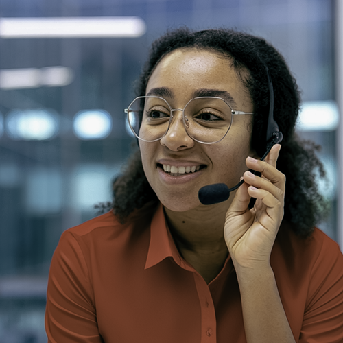 A customer service representative with a headset, ready to help with any questions or concerns.