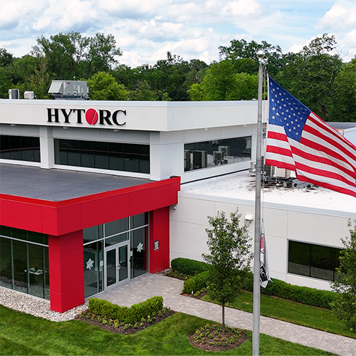 An aerial view of the HYTORC headquarters in Mahwah, New Jersey. An American flag is flying in front of the building.