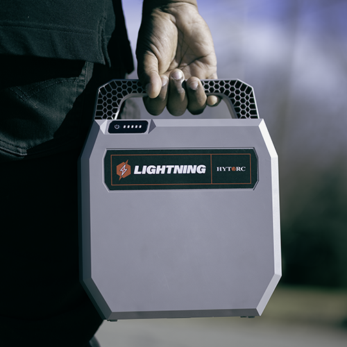 A close-up of a LIGHTNING Battery Pack held by a technician.