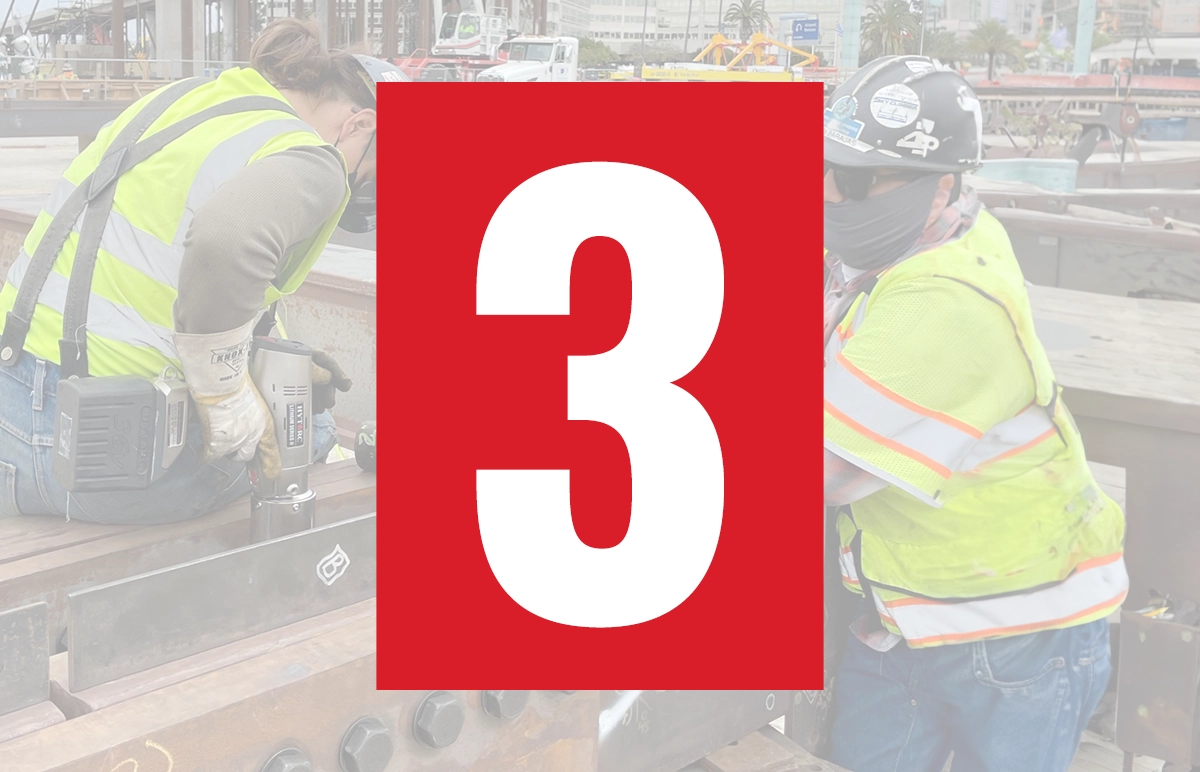 Technicians on site demonstrating a LITHIUM SERIES II Electric Torque Tool